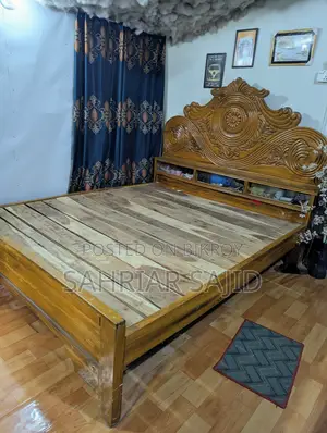 Rain tree wood bed used for 2 years.