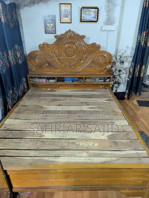 Rain tree wood bed used for 2 years.