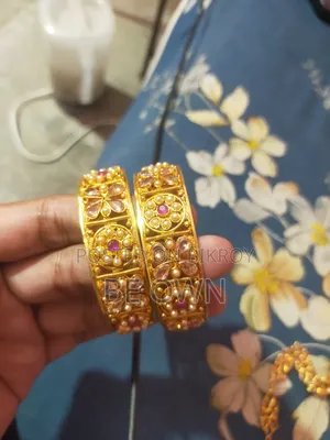 2 Pairs of Bangles and 2 Necklace Sets