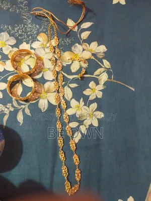 2 Pairs of Bangles and 2 Necklace Sets