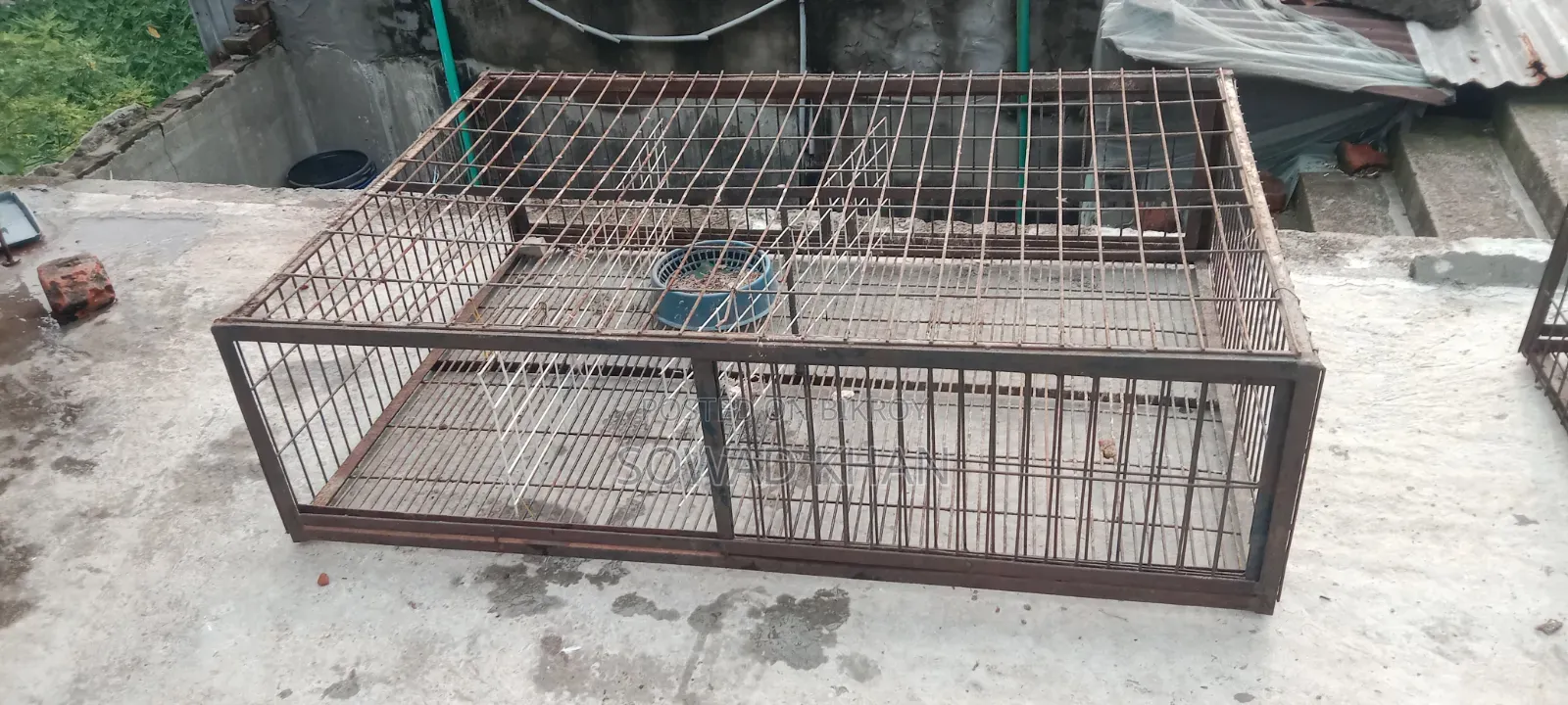 Van-sized chicken cage