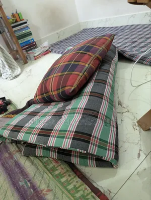 Study table, mattress, and pillow