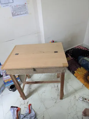Study table, mattress, and pillow