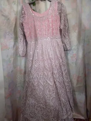 Gown with can-can inside. Used only once.