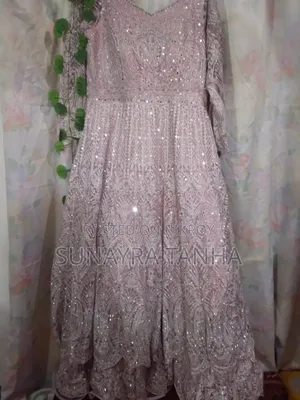 Gown with can-can inside. Used only once.