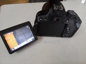 Canon 700d DSLR Camera, 50mm Prime Lens, Dummy Battery, 18-55mm Lens.