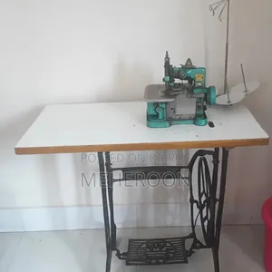 Butterfly Brand Vintage Green Overlock Interlock Machine