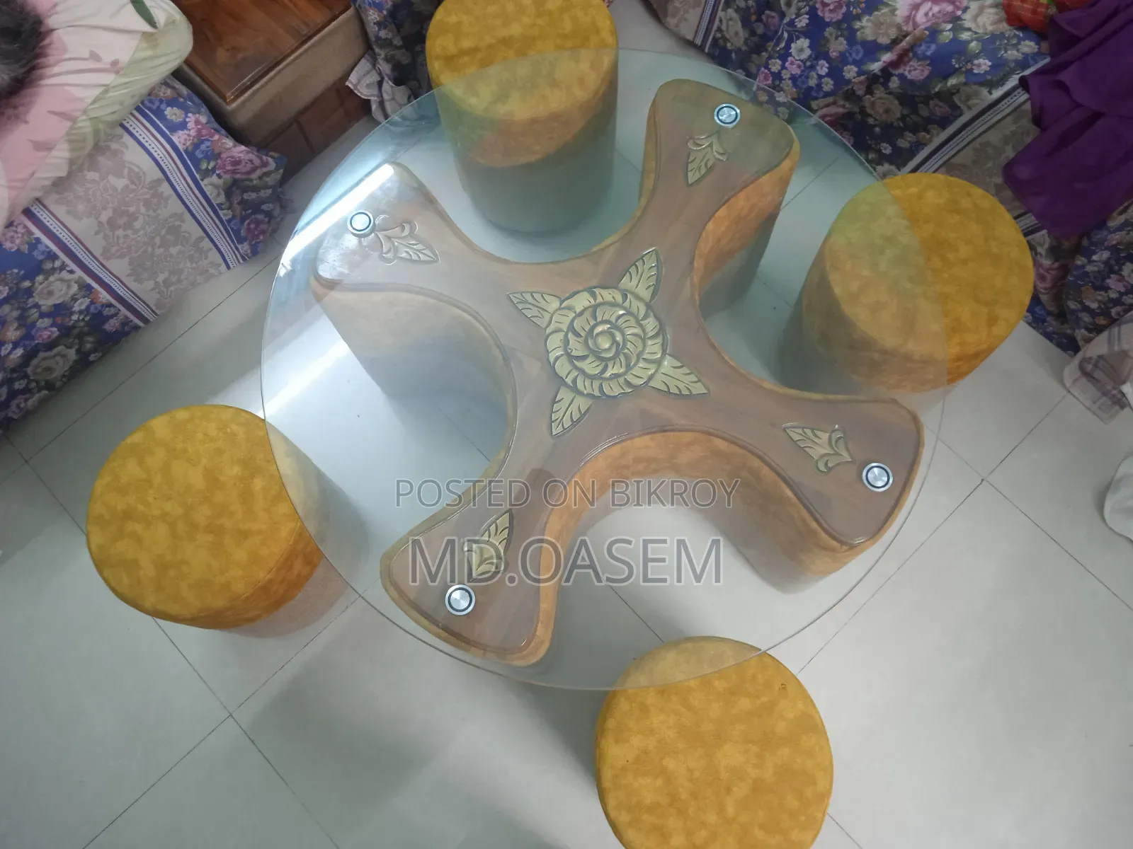 A tea table, with four seating chairs