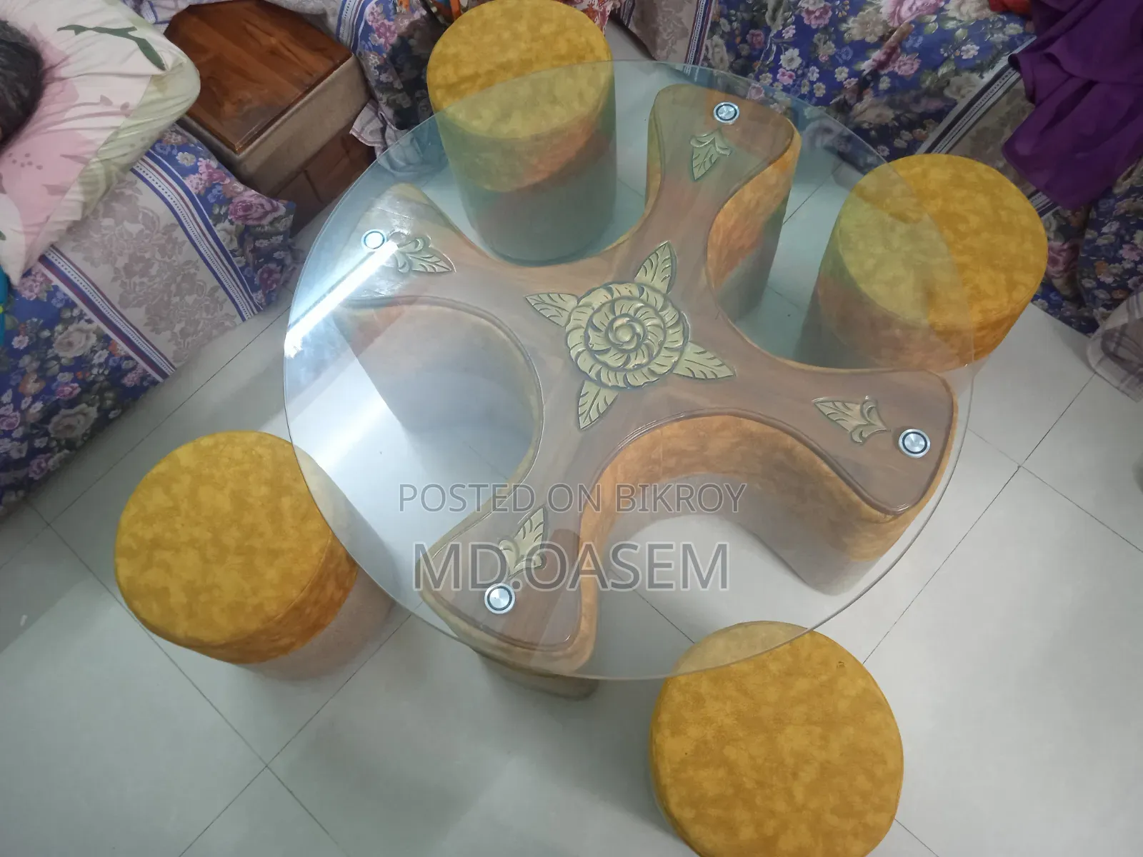 A tea table, with four seating chairs