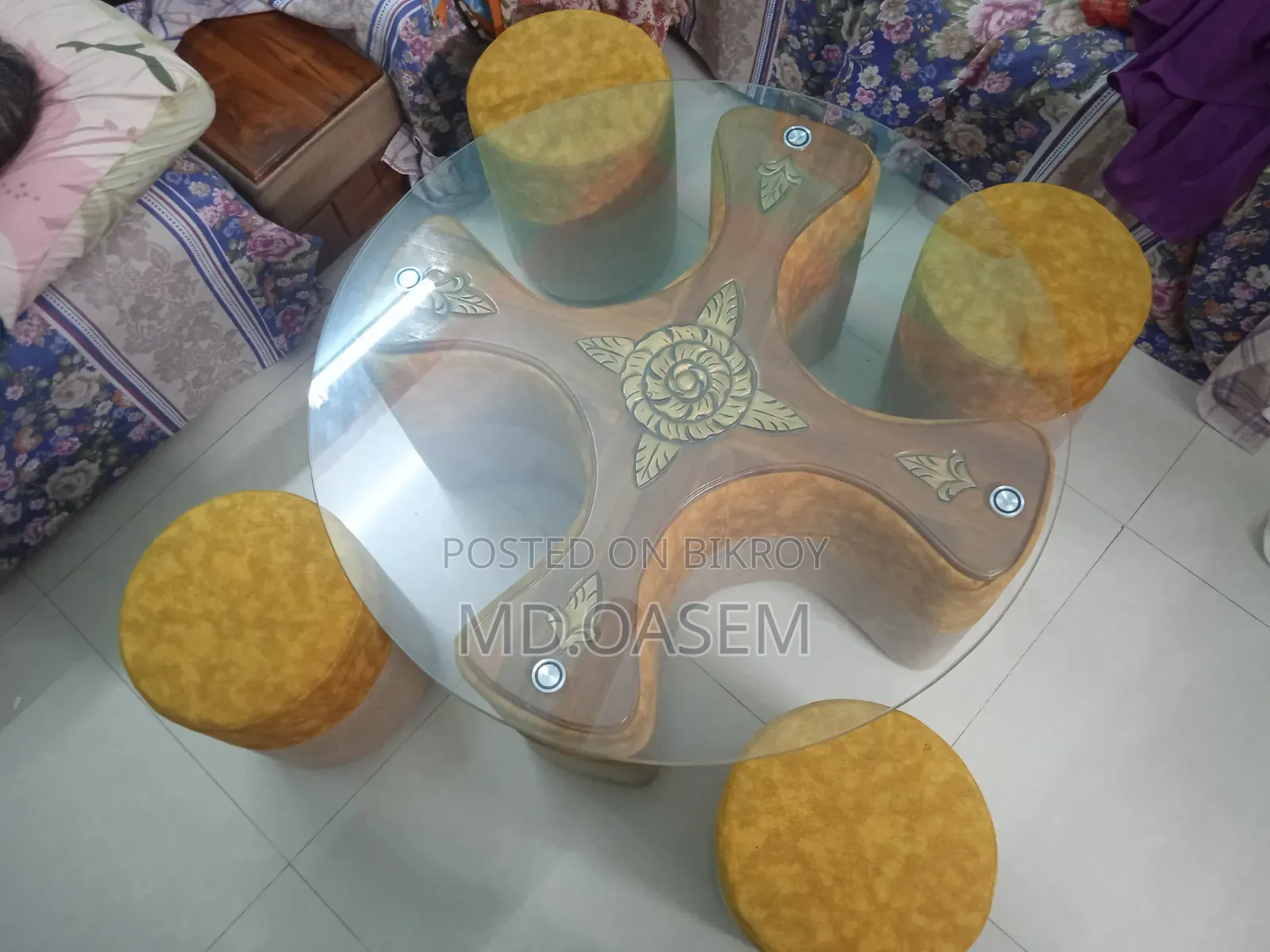 A tea table, with four seating chairs