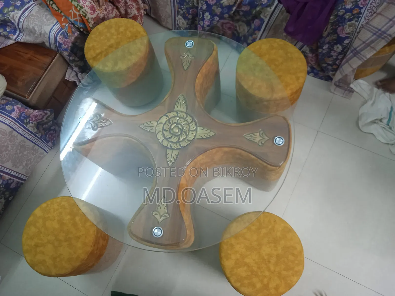 A tea table, with four seating chairs
