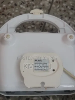 Sandwich maker used at home, in good condition