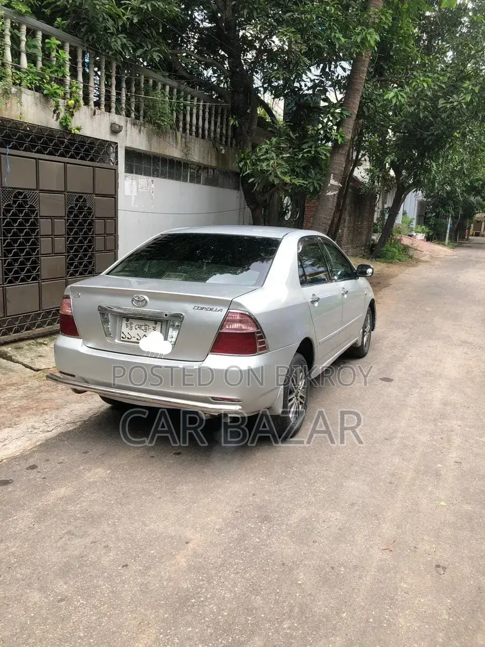 Toyota Corolla ২০০৪ সিলভার