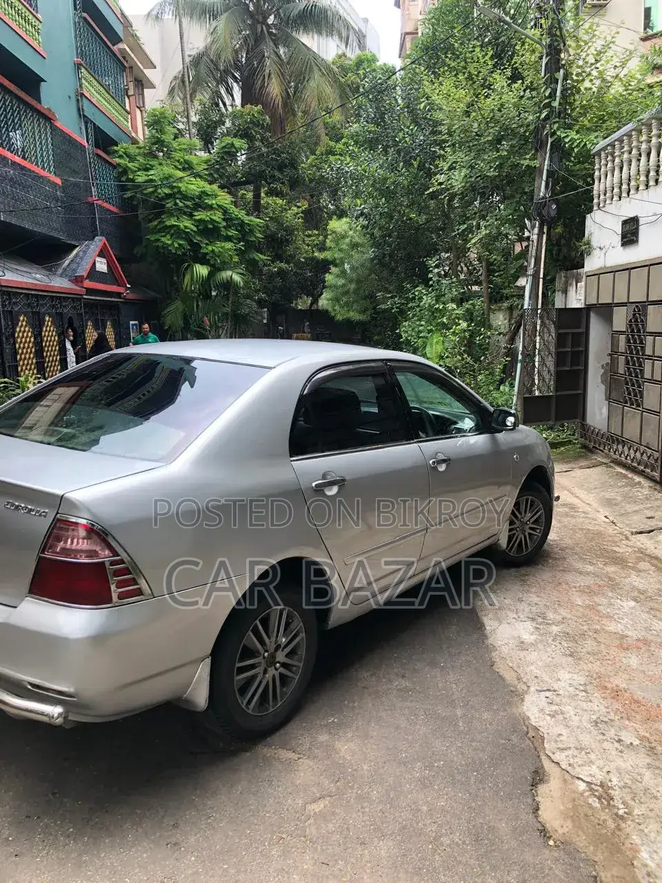 Toyota Corolla ২০০৪ সিলভার