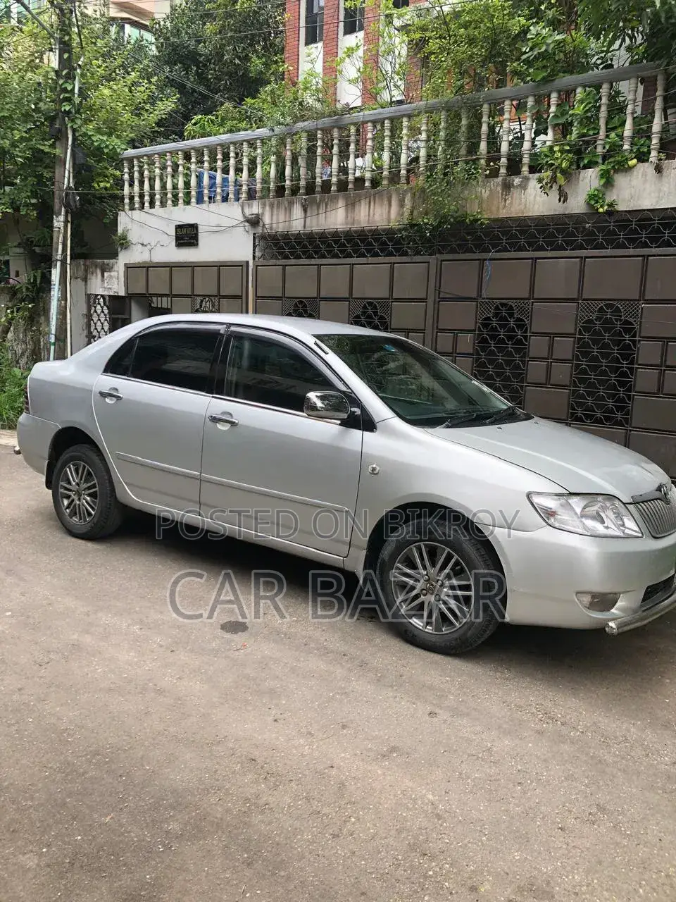 Toyota Corolla ২০০৪ সিলভার