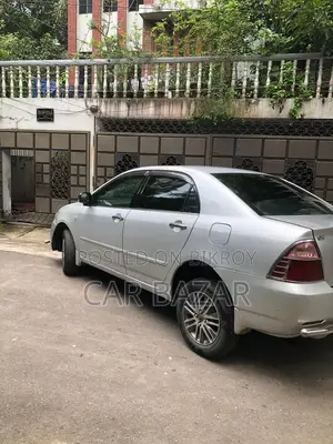 Toyota Corolla ২০০৪ সিলভার
