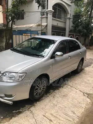 Toyota Corolla ২০০৪ সিলভার