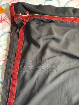 Used Black Saree With Red Side Design