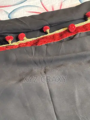Used Black Saree With Red Side Design