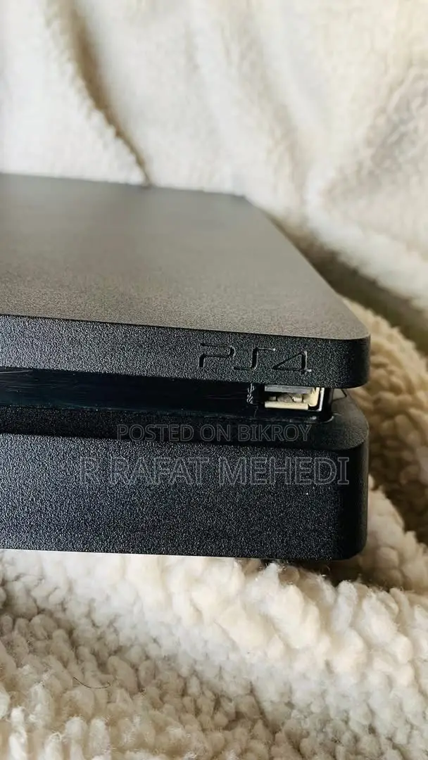 PS4 Slim 1 TB With Controller Cables.