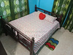 Teak wood bed for sale.