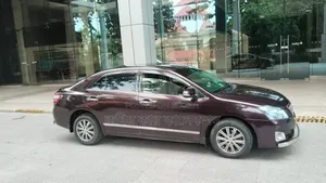 টয়োটা প্রিমিও ২০১৫ মেরুন