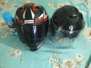 Two brand new helmets with free chain lube