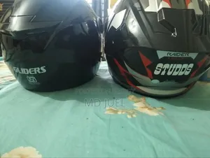 Two brand new helmets with free chain lube