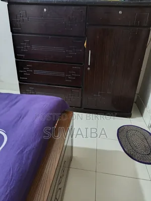 Bed and wardrobe for sale.