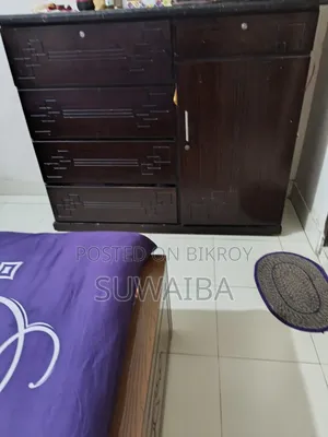 Bed and wardrobe for sale.