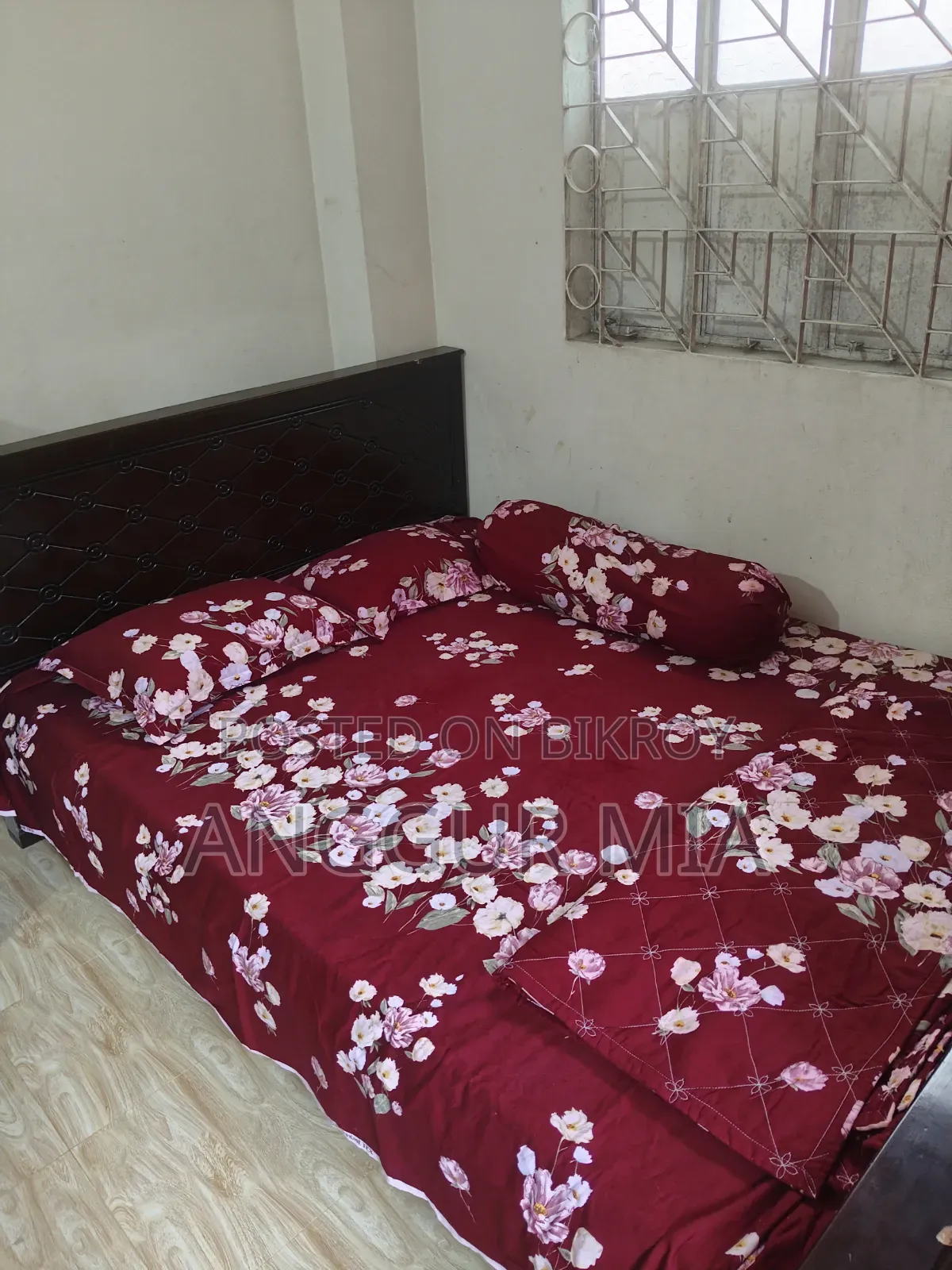 5 feet by 6 feet double Malaysian wood bed for sale, urgent