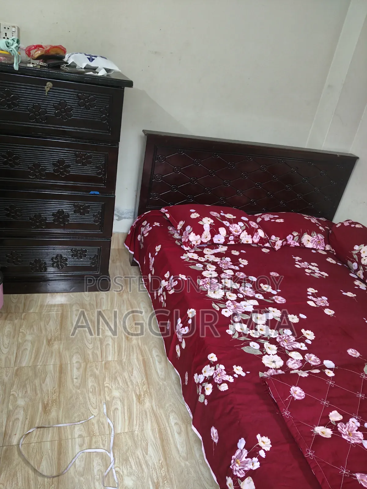 5 feet by 6 feet double Malaysian wood bed for sale, urgent