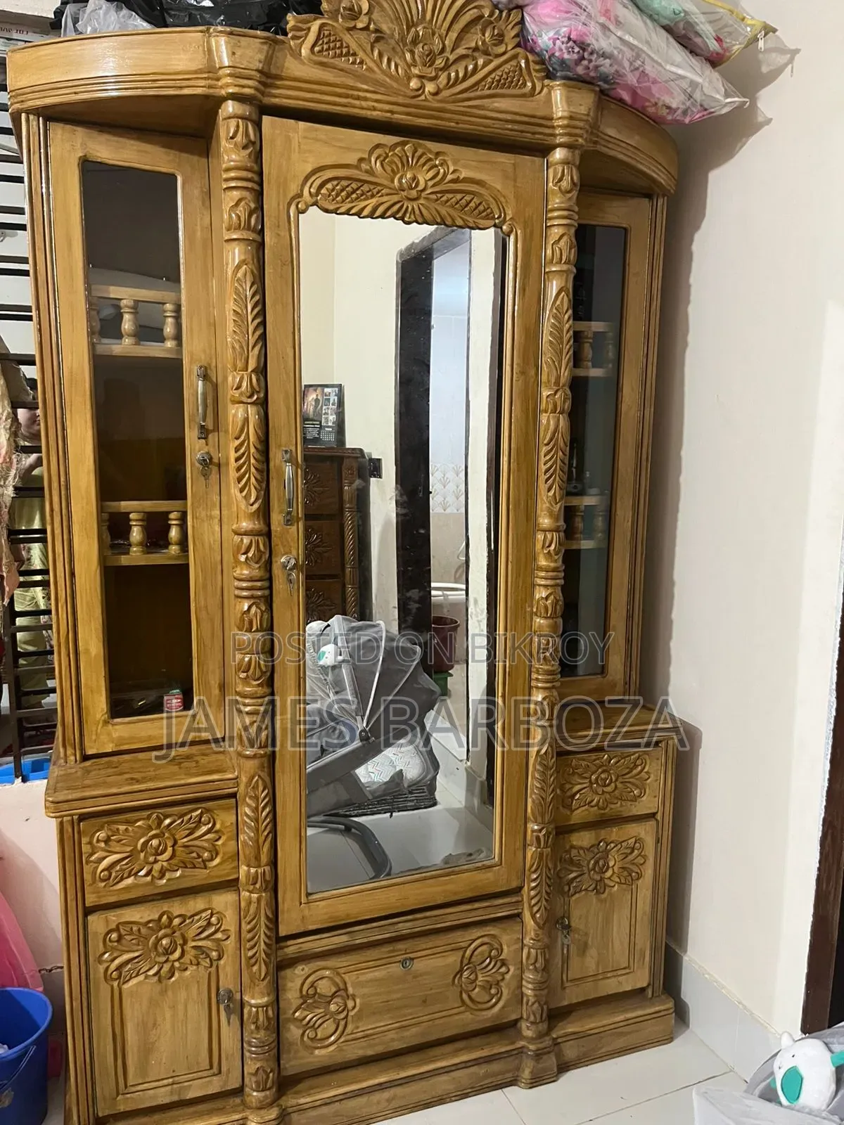A teak wood dressing table will be sold