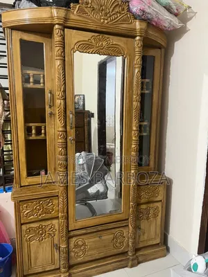 A teak wood dressing table will be sold