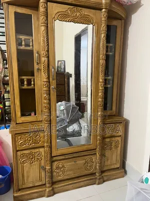 A teak wood dressing table will be sold