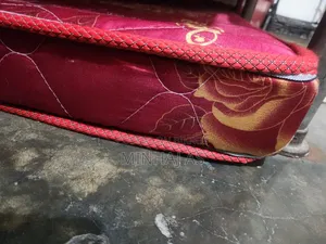 Styrofoam mattress. One corner is slightly broken.