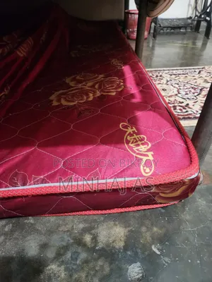 Styrofoam mattress. One corner is slightly broken.
