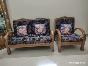 Teak wood sofa.