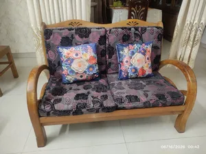 Teak wood sofa.