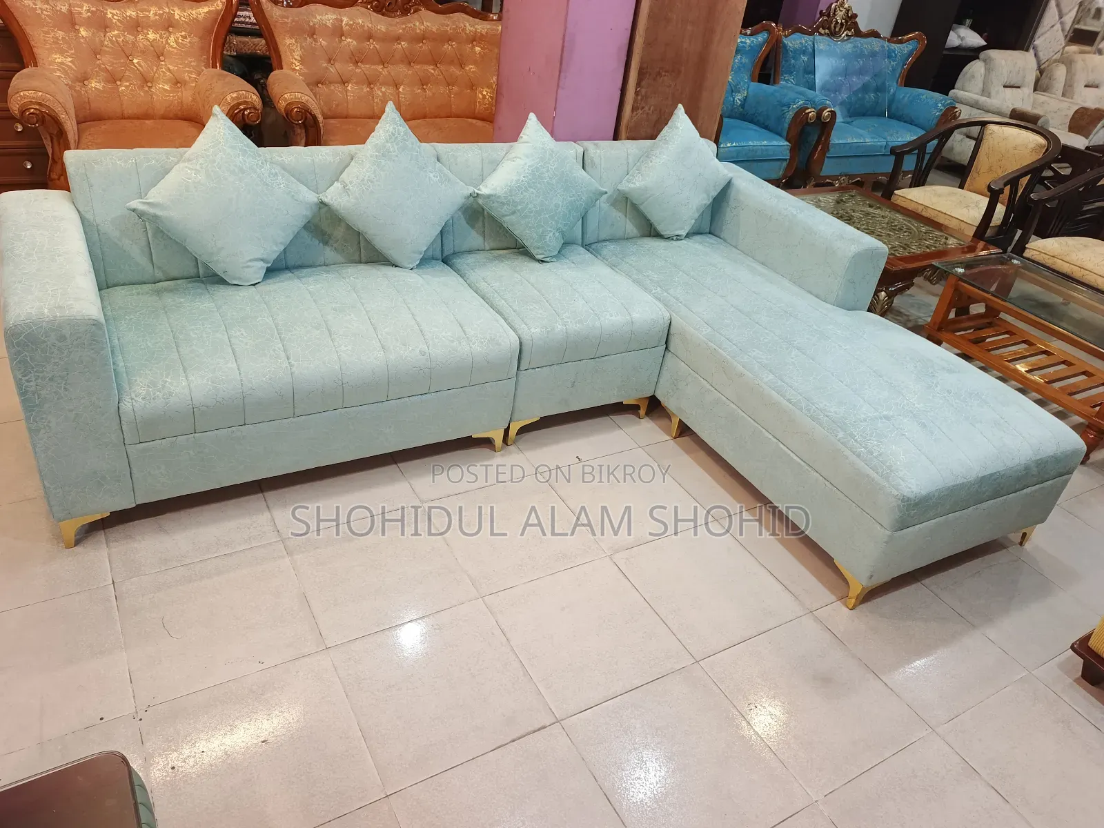 L-Shape Sofa. Made with metal legs. Inside frame made of Gamari wood.