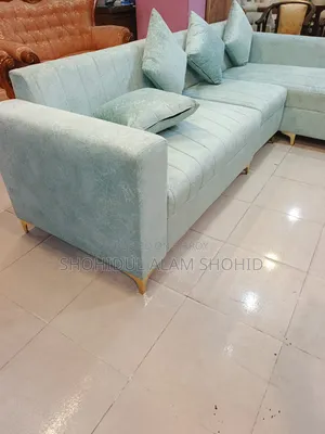 L-Shape Sofa. Made with metal legs. Inside frame made of Gamari wood.