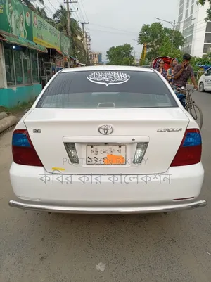 টয়োটা করোলা ২০০৪ সাদা