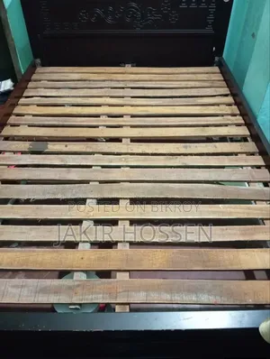 A 5/7 feet size bed for sale including mattress. Made of Malaysian wood.