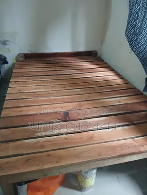 Wooden double bed, can accommodate two people, completely new bed.