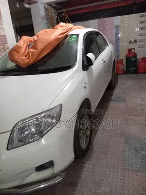টয়োটা অ্যাক্সিও ২০০৭ সাদা