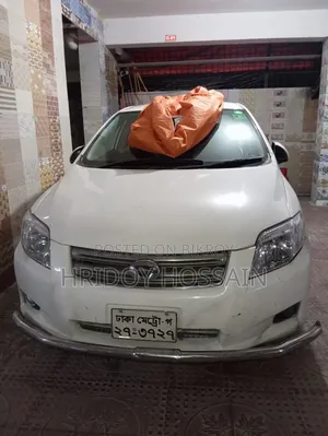 টয়োটা অ্যাক্সিও ২০০৭ সাদা