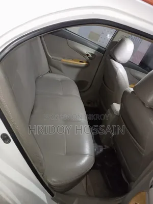 টয়োটা অ্যাক্সিও ২০০৭ সাদা