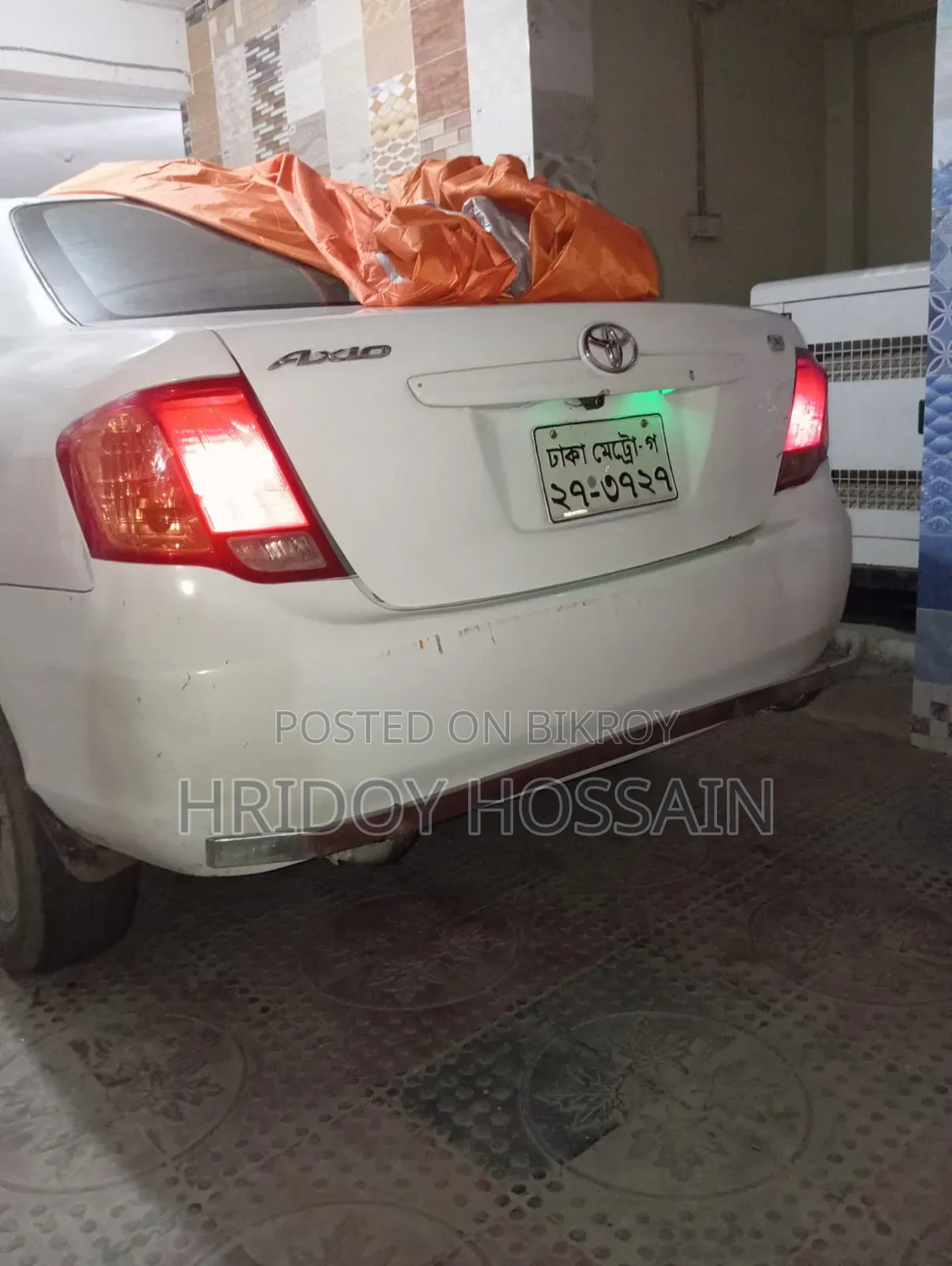 টয়োটা অ্যাক্সিও ২০০৭ সাদা