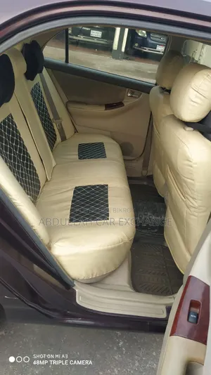টয়োটা করোলা ২০০৩ রেড