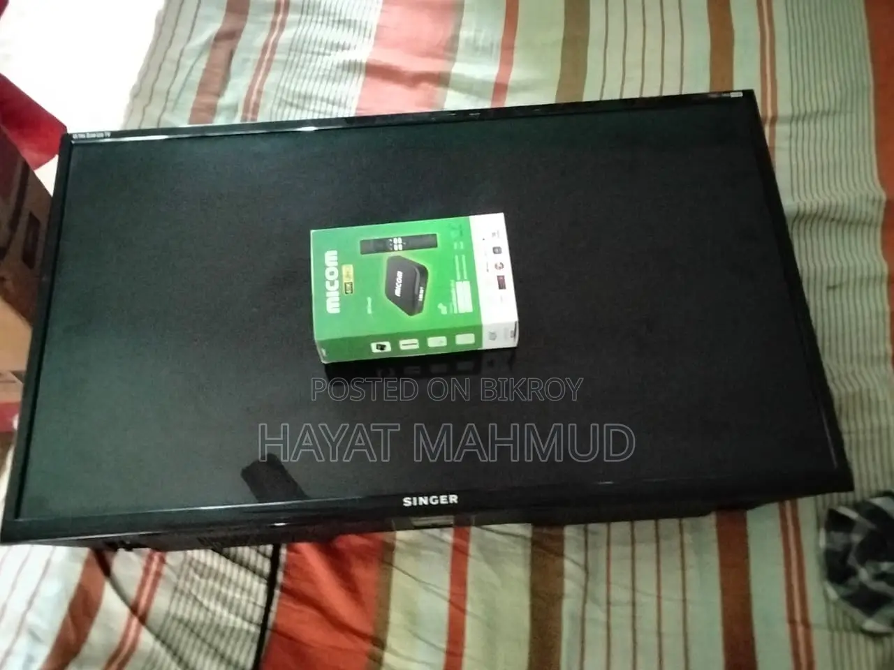 Brand new condition Singer LED TV and a setup box used for one month